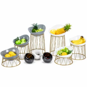 Gold metal fruit display stand with ceramic bowls for hotel buffet serving