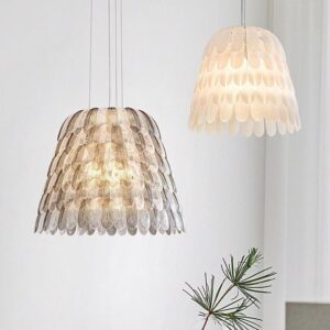 Modern feather restaurant pendant light in white and gray with creative layered shade design