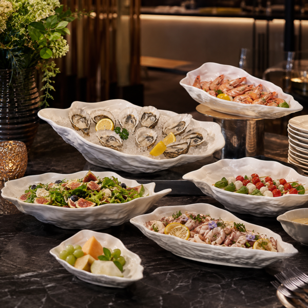 KJ079-Elegant white ceramic shell serving plate Elegant white ceramic shell serving plate for premium dining presentation