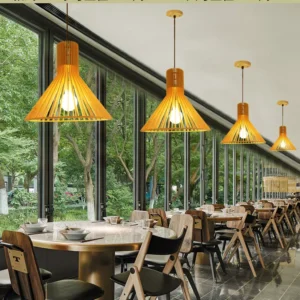 Natural wooden pendant lights installed in restaurant dining area